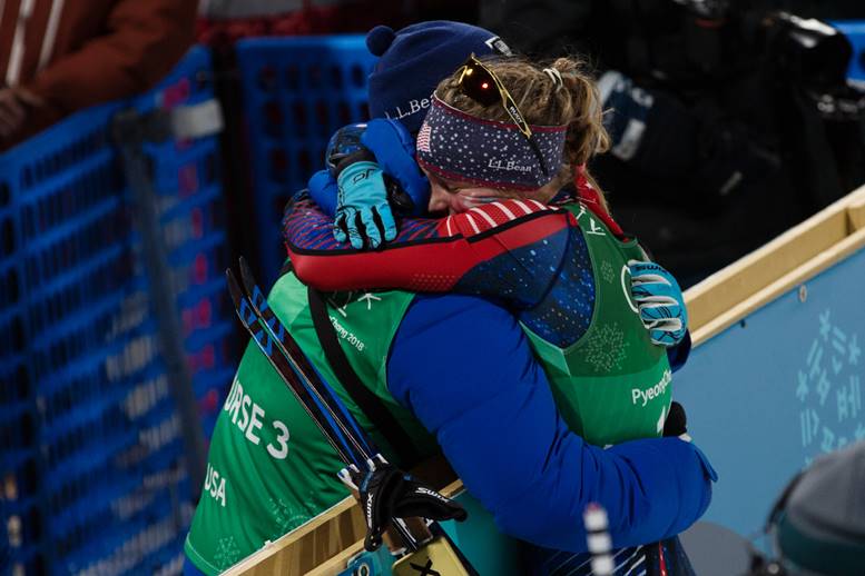 Jessie Diggins hugging her coach at the Olympics.