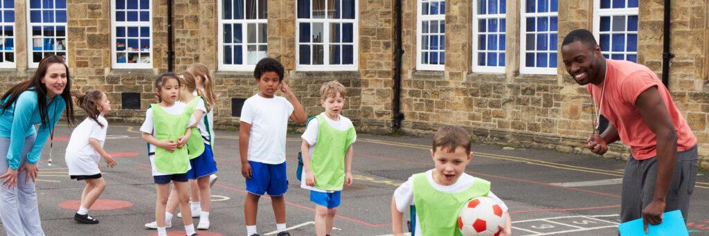 Group Of Children In School Physical Education Class