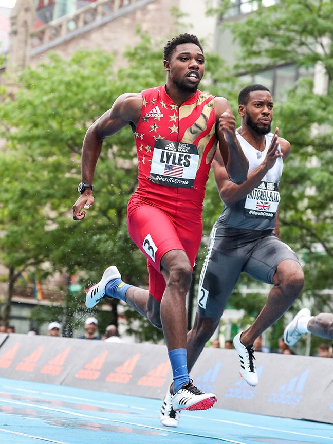 Noah Lyles sprinting in a race