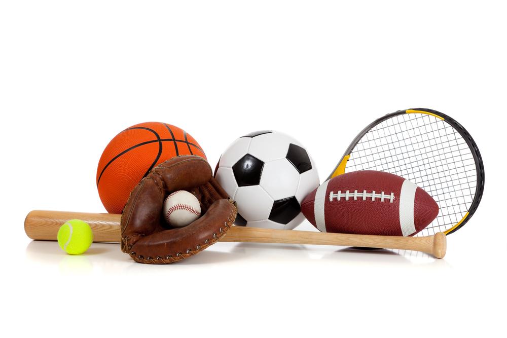 Multiple different sports equipment on white background.