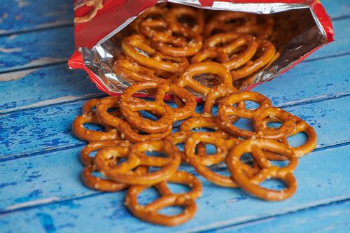 Pretzels falling out of a bag.