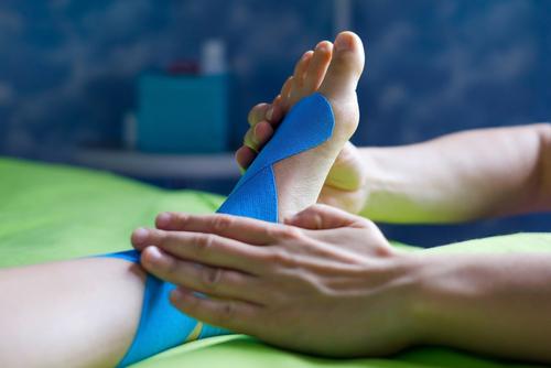 A foot being taped up.